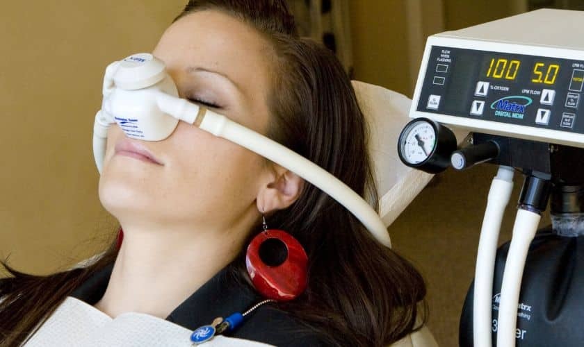 Patient receiving nitrous oxide sedation during dental treatment in Puyallup.